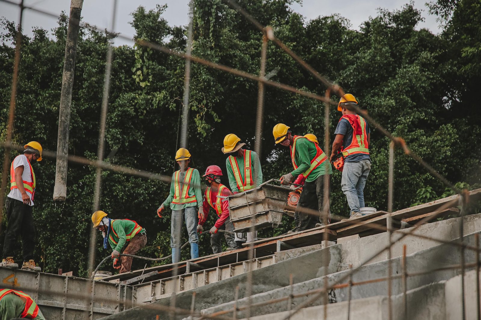Workers on scaffolding on a jobsite